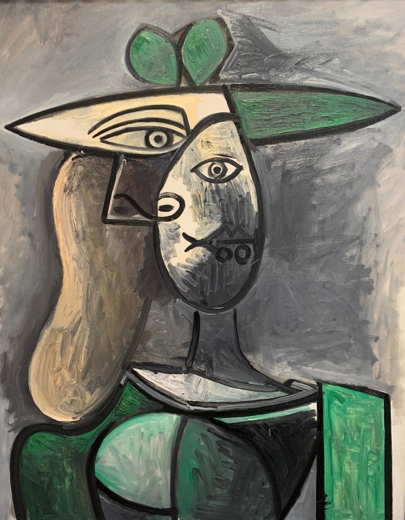 Woman in a green hat by Picasso